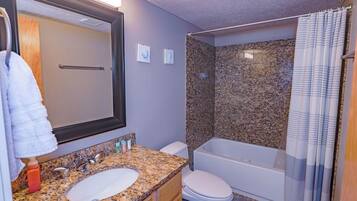 Hair dryer, towels, soap, shampoo