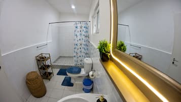 Deluxe Double Room, Pool View | Bathroom | Shower, free toiletries, towels, soap