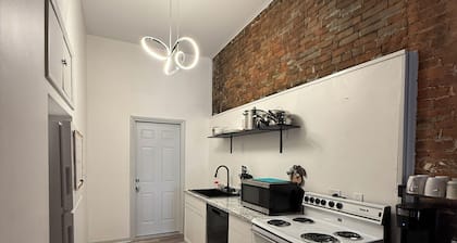 Charming upper apartment in downtown Elmore with WiFi, AC, & Work space