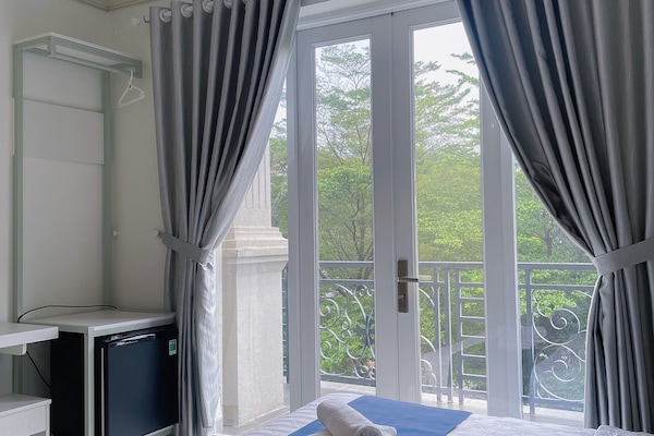 Camera Deluxe con letto matrimoniale o 2 letti singoli | Postazione laptop, Wi-Fi gratuito