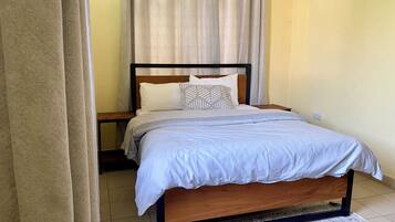 2 bedrooms, desk, iron/ironing board, travel crib