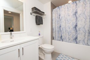 Hair dryer, towels, soap, toilet paper