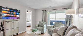 2BR Waterfront Condo w/ Pool access, Dock, Patio Views & 3 Miles from LEGOLAND
