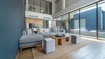 5 Bedroom Pool Villa (Yuugen) | Living area | 48-inch LCD TV with cable channels, DVD player