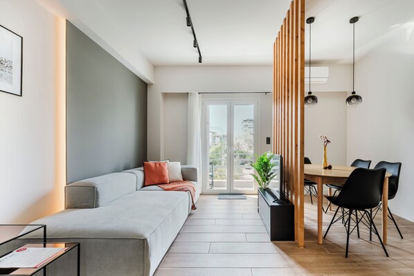 Apartment, 1 Bedroom, Balcony, City View | Living room | 42-inch Smart TV with digital channels, streaming services