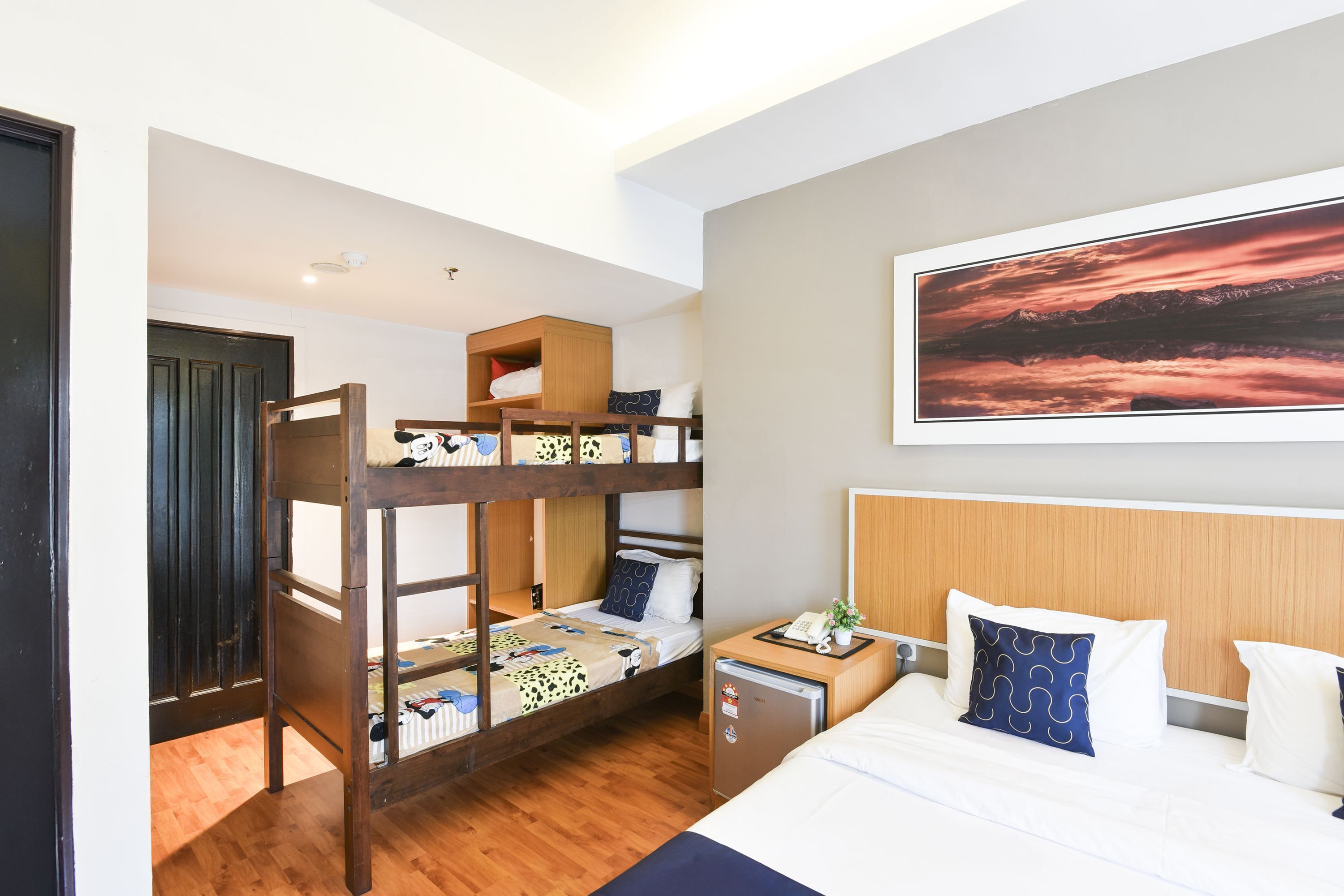 Premium bedding, desk, laptop workspace, free WiFi