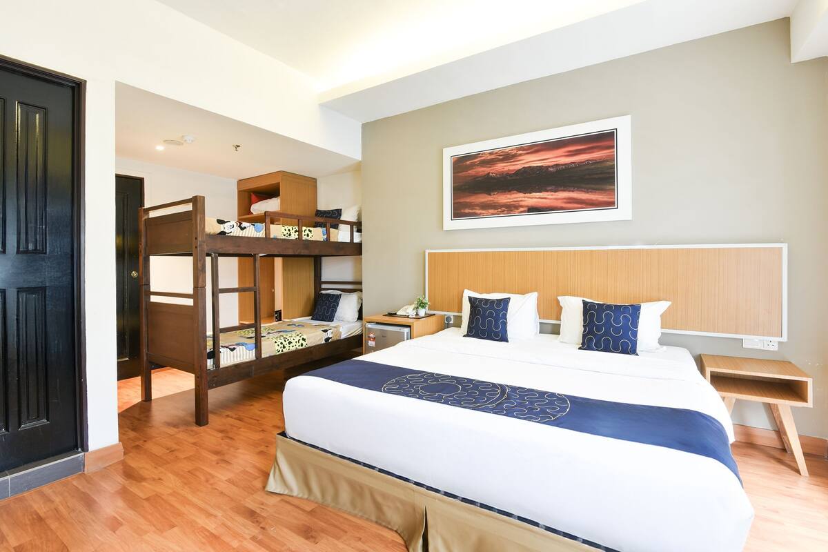 Premium bedding, desk, laptop workspace, free WiFi