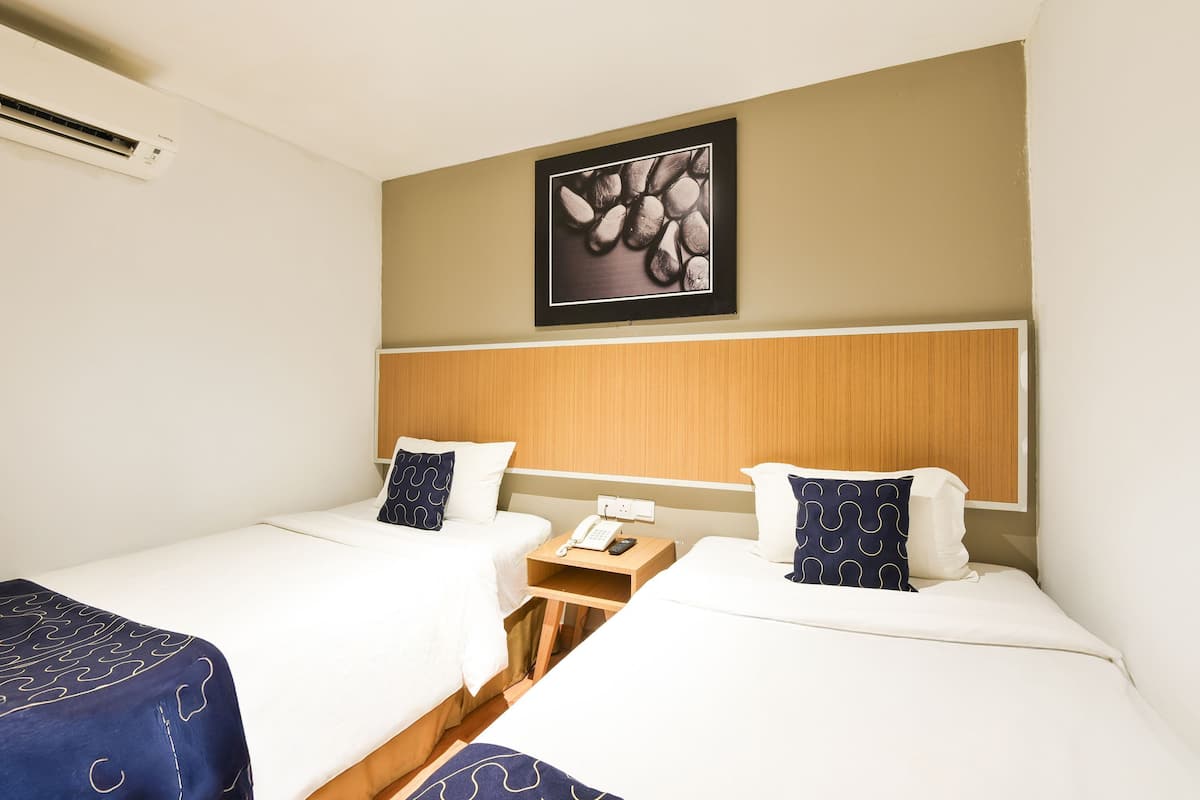 Premium bedding, desk, laptop workspace, free WiFi