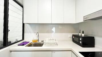 Standard Apartment, 3 Bedrooms | Private kitchen | Fridge, microwave, electric kettle