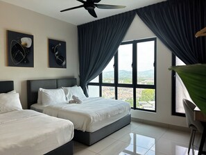 Deluxe stúdió lakosztály | Vasaló/vasalódeszka és ágynemű