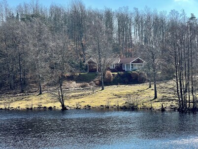 Cozy vacation home with a view of the water and forest. Pet friendly.