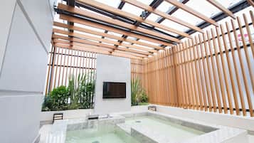 Separate tub and shower, hair dryer, bathrobes, slippers
