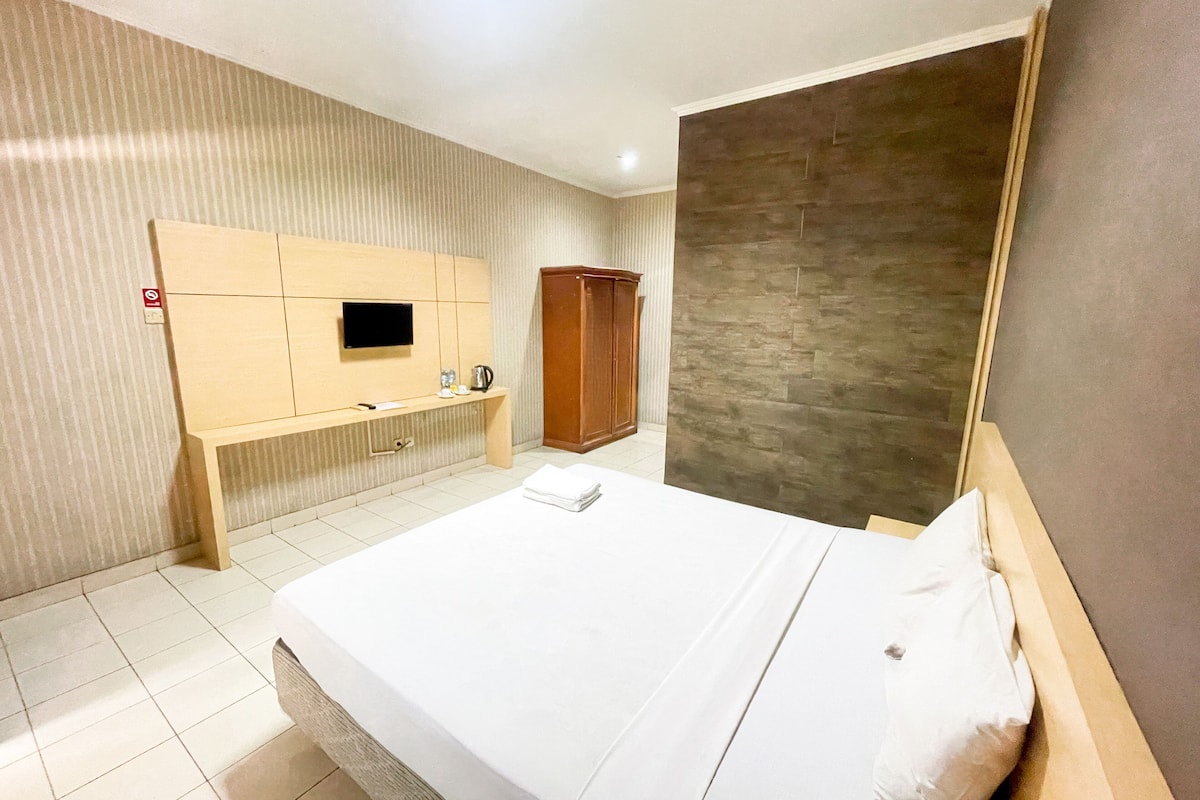 Habitación Deluxe con 1 cama doble o 2 individuales | Escritorio, espacio para trabajar con un portátil, cortinas opacas