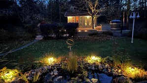 Ferienhaus, 2 Schlafzimmer, Balkon, Gartenblick | Unterkunftsgelände