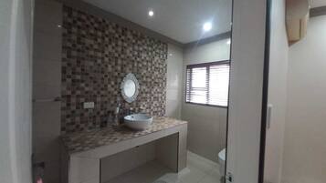 Shower, towels, soap, toilet paper