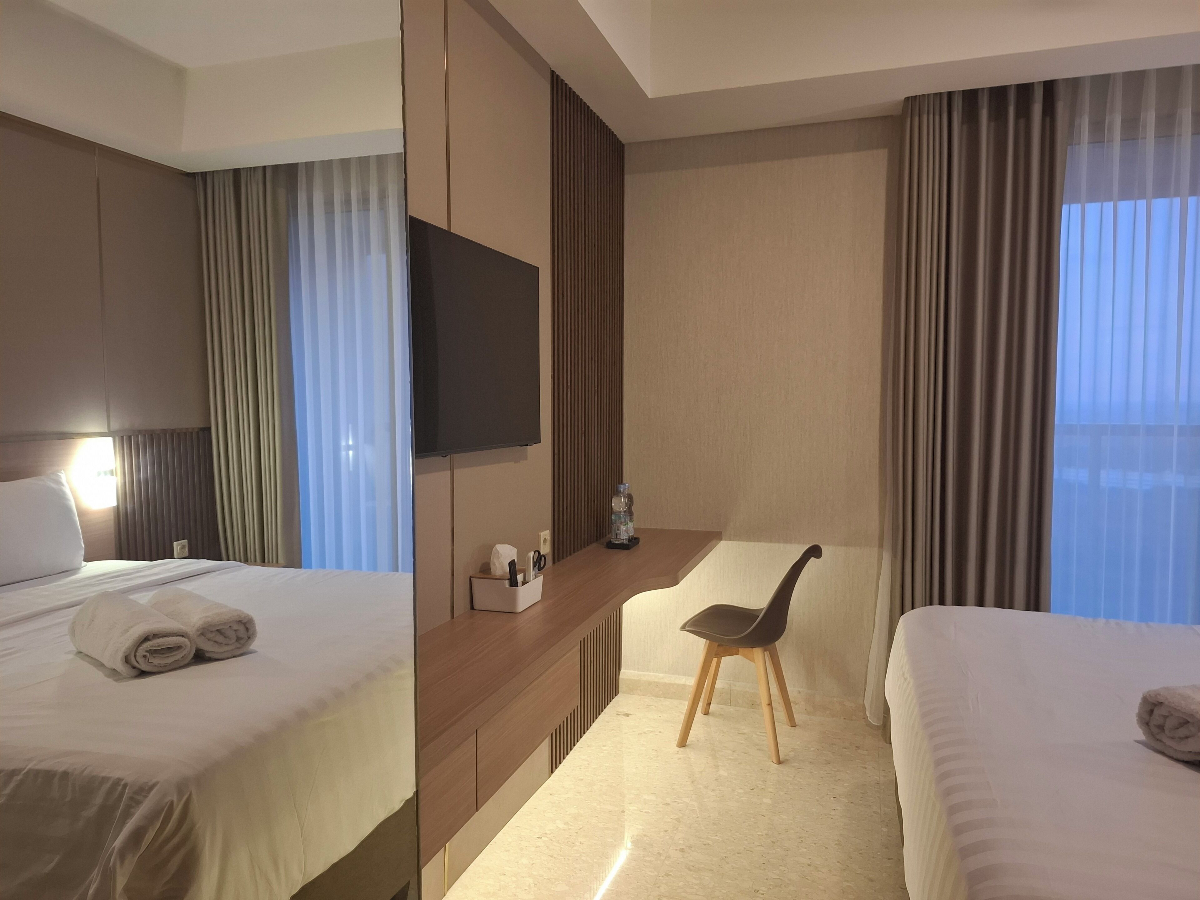 Premium bedding, desk, laptop workspace, free WiFi