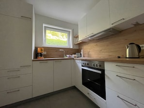 Réfrigérateur, four, plaque de cuisson, lave-vaisselle