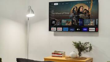 Apartment, Garden View | Living area | TV