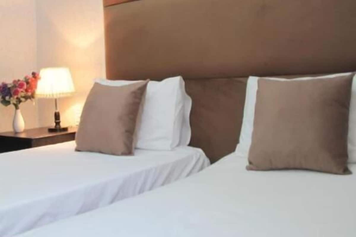 Standard Twin Room, City View | Premium bedding, minibar, in-room safe, individually decorated