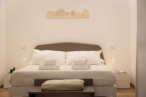 3 habitaciones, tabla de planchar con plancha, wifi y ropa de cama