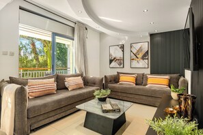 Leilighet, hageutsikt | Oppholdsområde