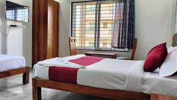 Hypo-allergenic bedding, down comforters, desk, laptop workspace