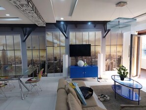 Familiekamer, balkon, uitzicht op de stad | Woonruimte