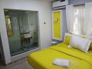 Family Room, Balcony, City View | Desk, laptop workspace, blackout curtains, soundproofing