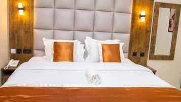 Deluxe Room, Balcony, City View | Desk, laptop workspace, blackout drapes, soundproofing