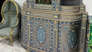 A decorative cabinet with intricate blue and gold patterns, a glass display case, and a matching chair. - Dar Diaf - El Djelfa (Djelfa)