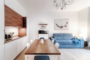 Family Apartment, City View | Living area | 32-inch LED TV with digital channels - Pleasant Family Apt next to Lake Como  (Como)