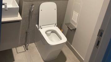 Hair dryer, towels, soap, toilet paper