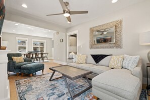 House, Multiple Beds, Patio, Garden View (829 Smith Street) | Living area | 55-inch flat-screen TV with digital channels, fireplace - CSU Hideaway King Bd, Backyard Oasis, EV Charger (Fort Collins)