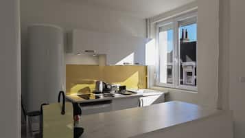 Fridge, microwave, stovetop, coffee/tea maker