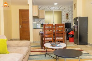 Smart TV - Nimmoh's Homestays @Kishan Towers in Nanyuki. Elegantly furnished, superb views. (Nanyuki)