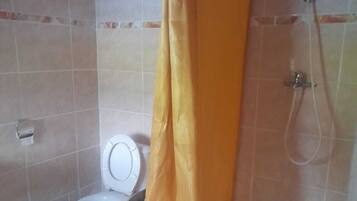 Shower, towels, soap, toilet paper