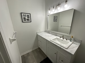 Hair dryer, towels, soap, toilet paper