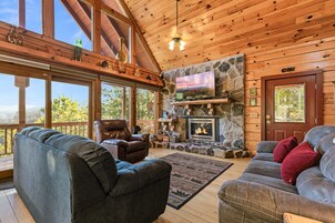 Signature Cabin, Multiple Beds, Kitchen, Mountain View | Living room | 65-inch Smart TV with digital channels, fireplace
