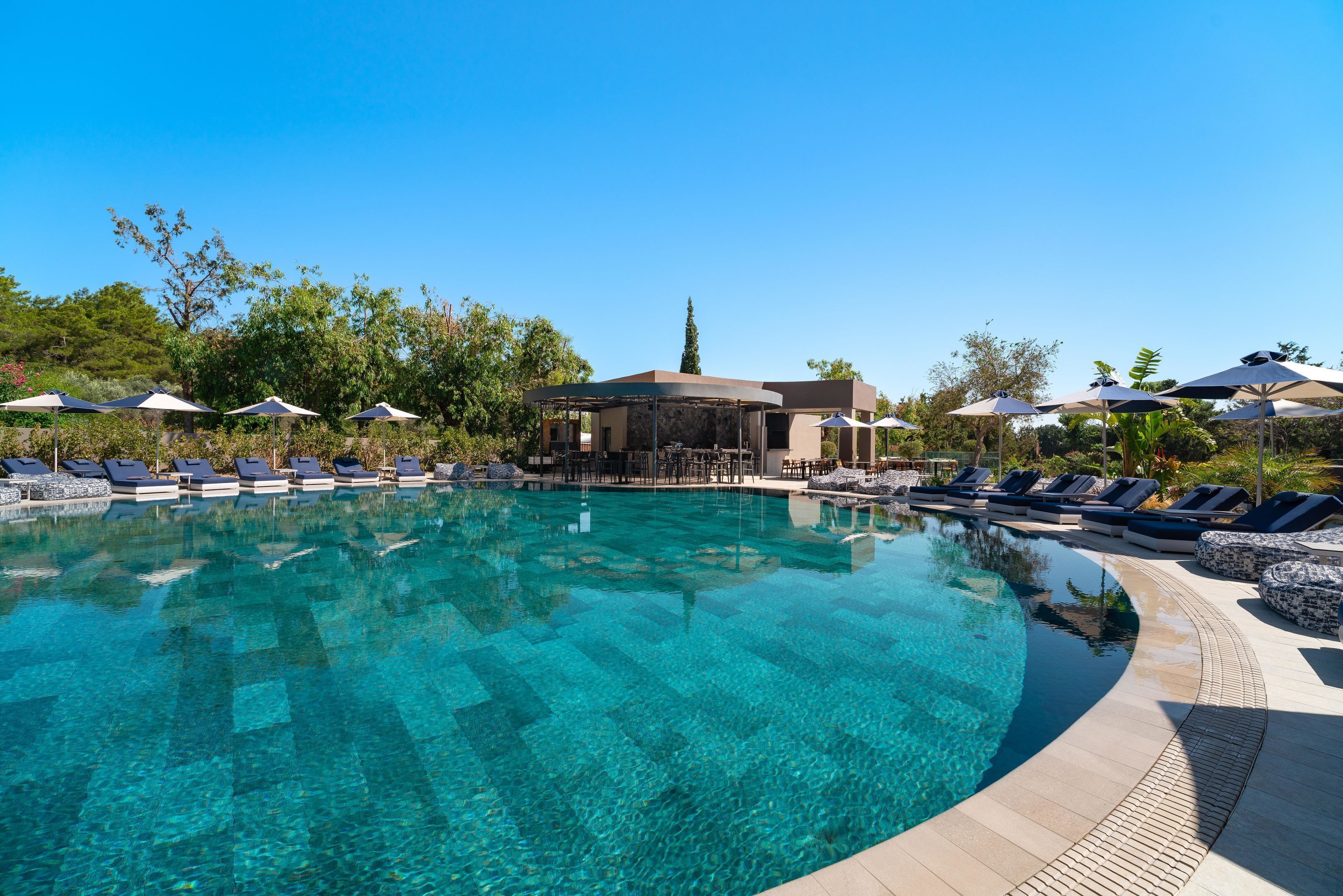 Outdoor pool, open 8:00 AM to 7:00 PM, pool umbrellas, sun loungers