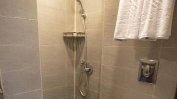 Combined shower/bathtub, hair dryer, towels, soap