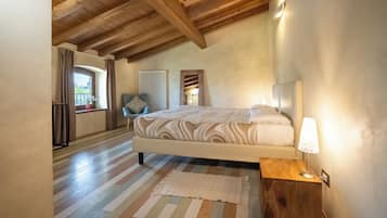 Habitación Deluxe, vistas al jardín | Sábanas de algodón egipcio y ropa de cama de alta calidad
