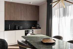 Private kitchen - Charming 3-bedroom apartment in enchanting Gdańsk with parking (Gdansk)