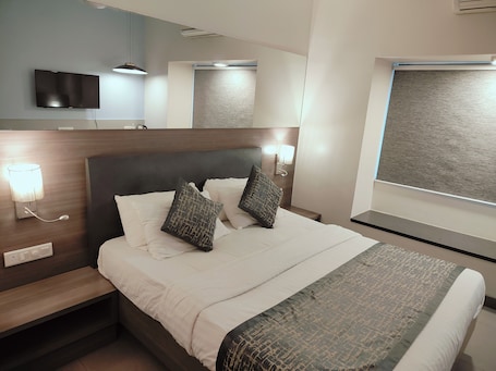 Ropa de cama de alta calidad y tabla de planchar con plancha