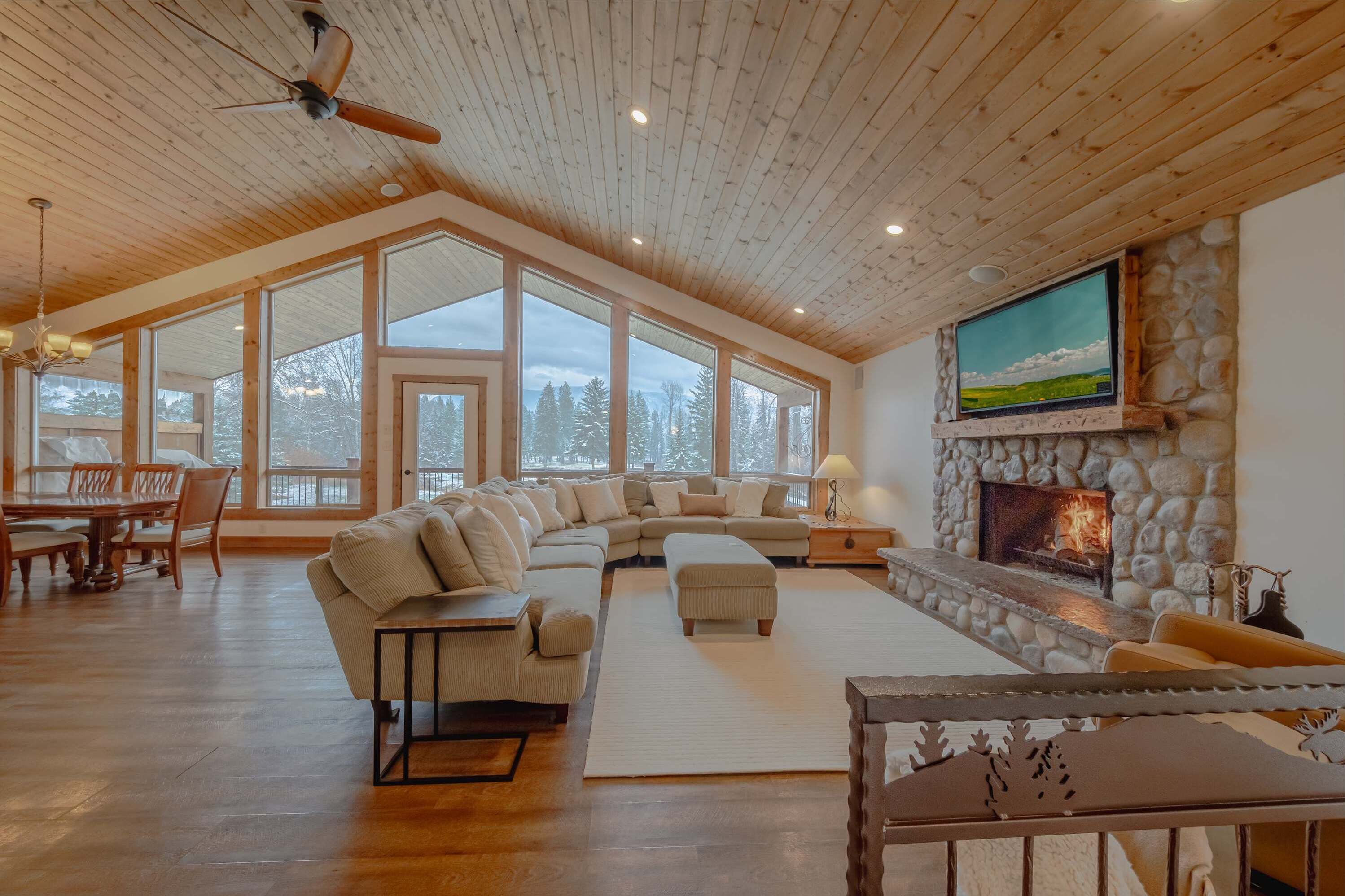 House, Multiple Beds, Patio, Mountain View (Flathead River Retreat) | Living area | 55-inch flat-screen TV with digital channels, fireplace