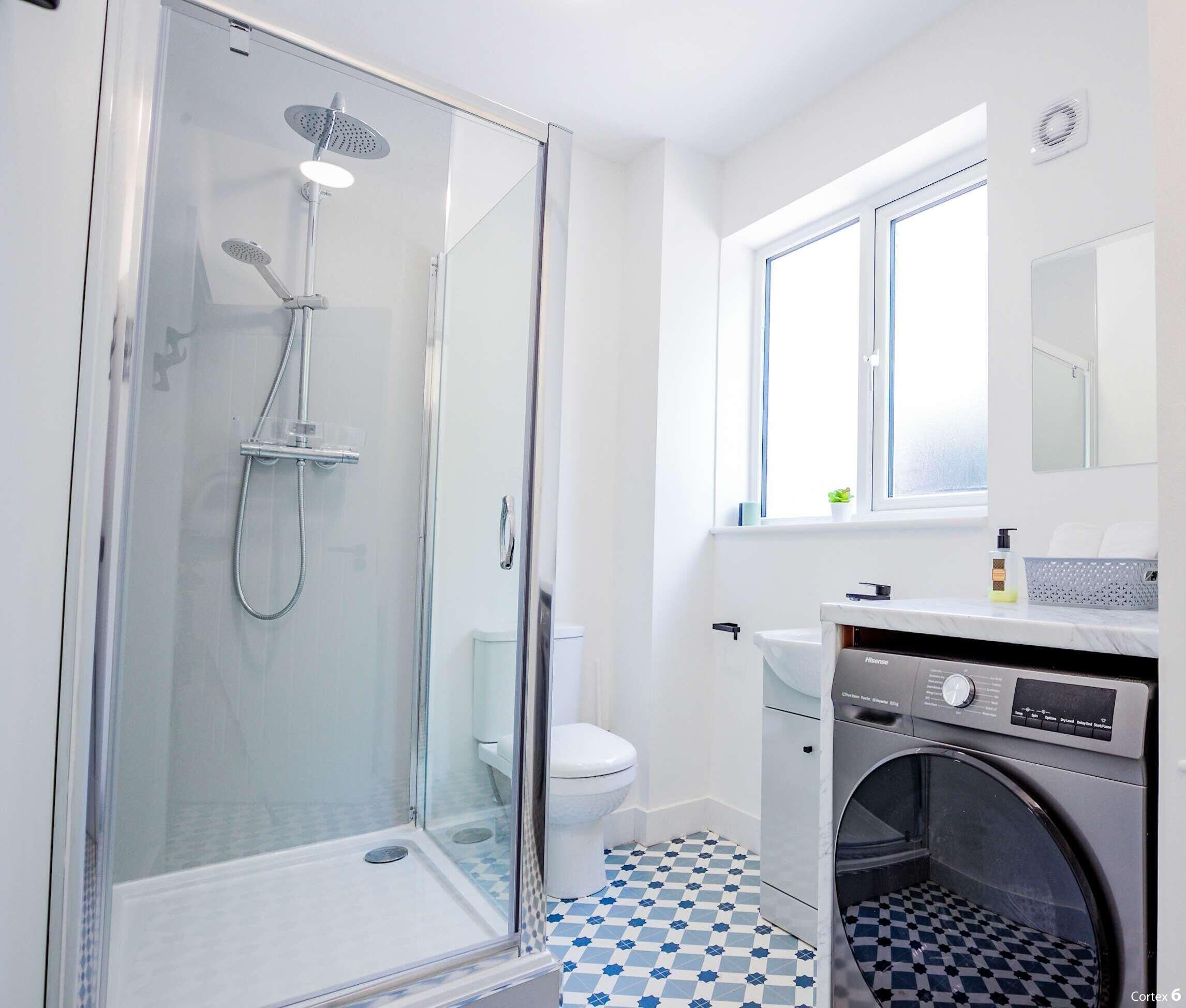 Shower, hair dryer, towels