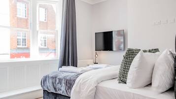 1 chambre, fer et planche Ă repasser, Wi-Fi, draps fournis