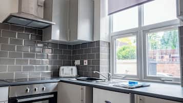 Fridge, microwave, toaster, cookware/dishes/utensils