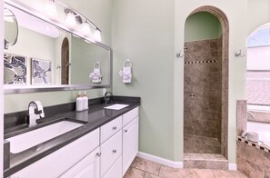 Shower, hair dryer, towels, shampoo