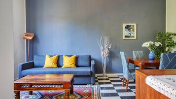 Apartamento, 1 cama de casal e sofá-cama, sacada | Área de estar