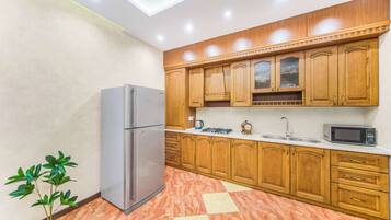 Apartament familiar, balcó | Cuina privada | Bullidora elèctrica